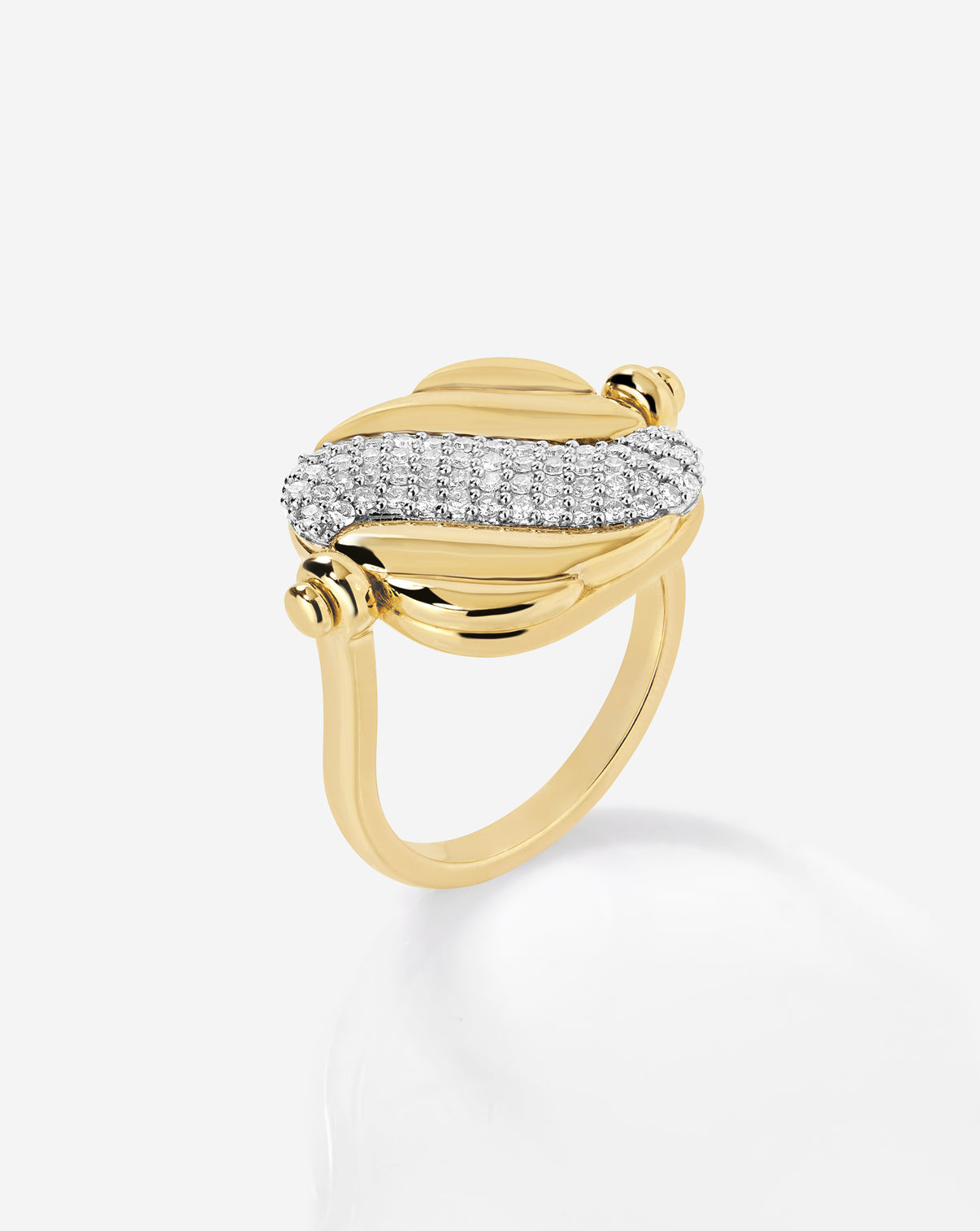 Close up top angled view of swivel pearl + pavé ring showcasing glittering pavé side with 57 round natural diamonds.