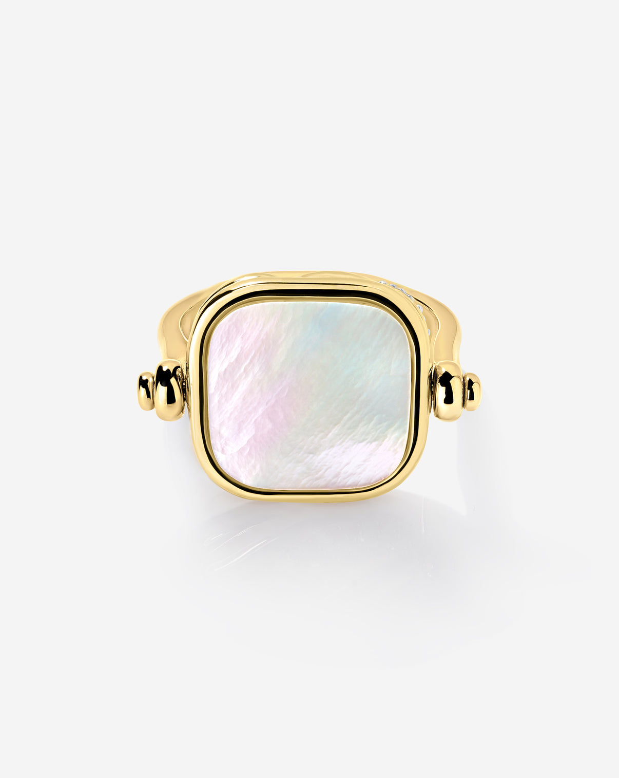 Close up front view of swivel pearl + pavé ring showcasing luminous pearl side.