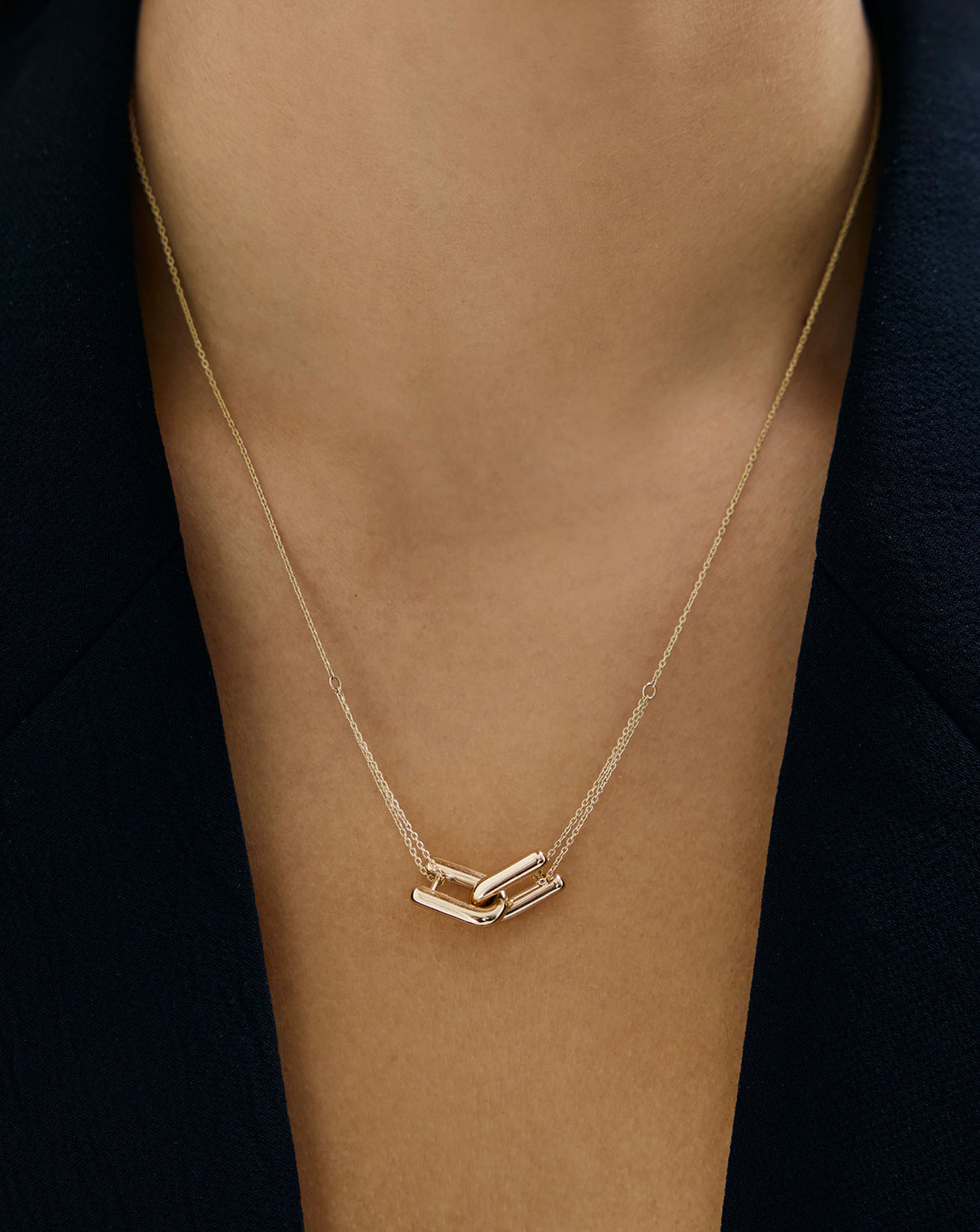 Woman wearing Ring Concierge Link Chain Necklace from Holiday Gifting Collection
