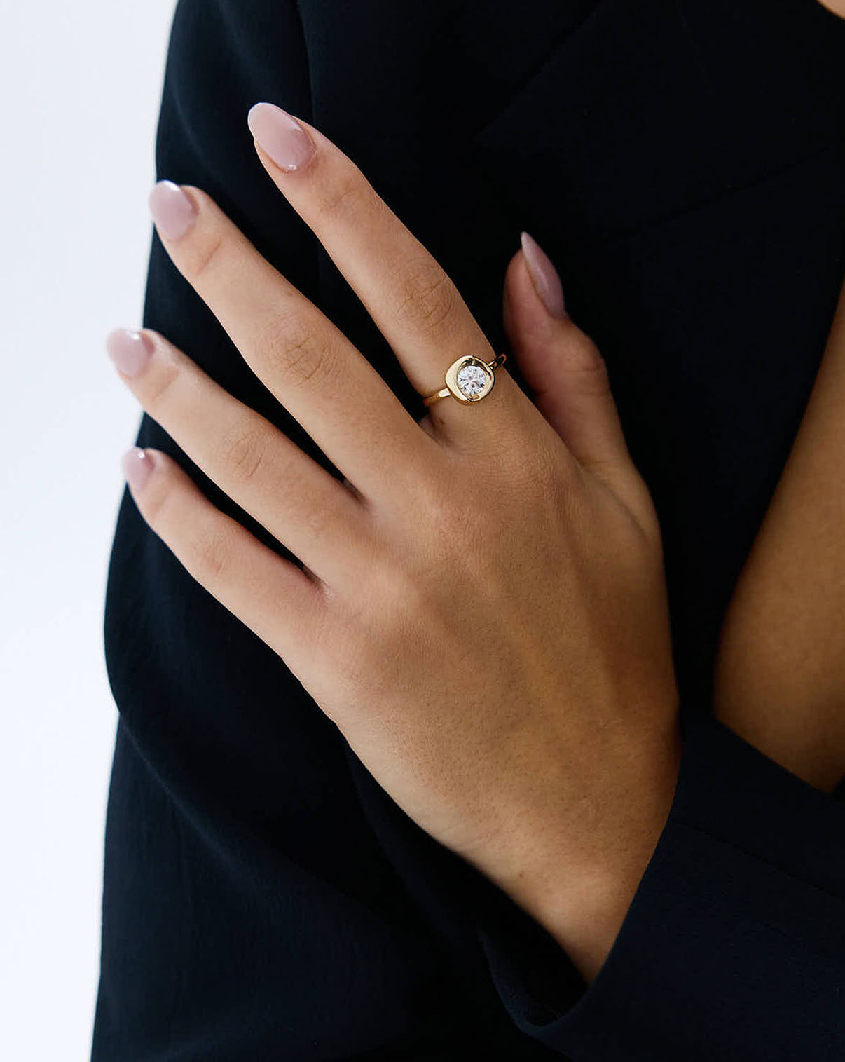 Model wearing the 14k solid gold Organic Shapes Center Stone Ring