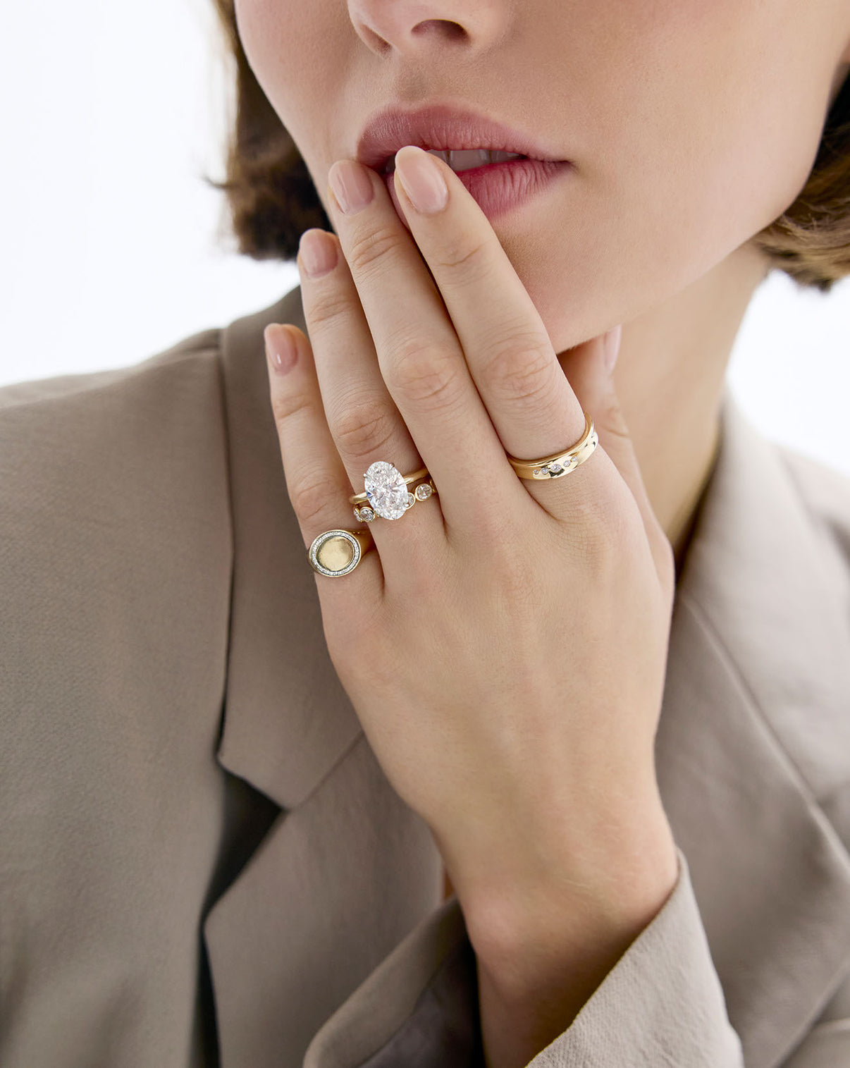 On-model image wearing Organic Shapes Diamond Row Ring along with other ring styles