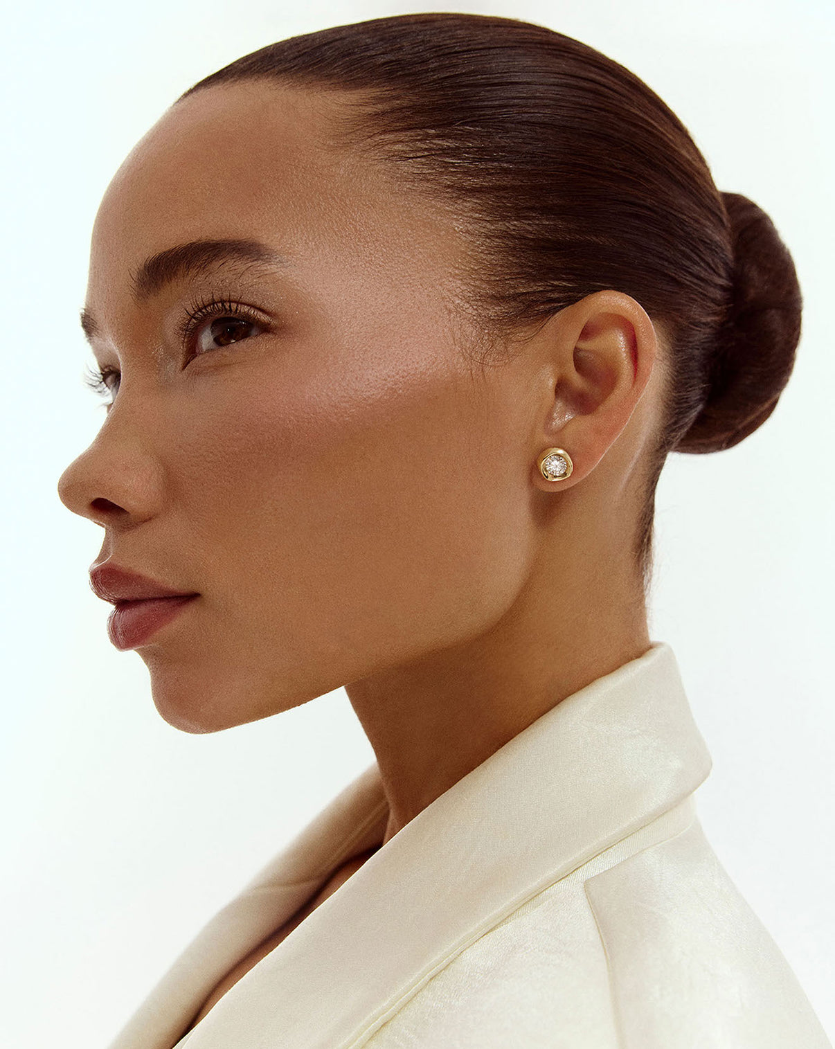 Model wearing the 14k solid gold Organic Shapes Stud