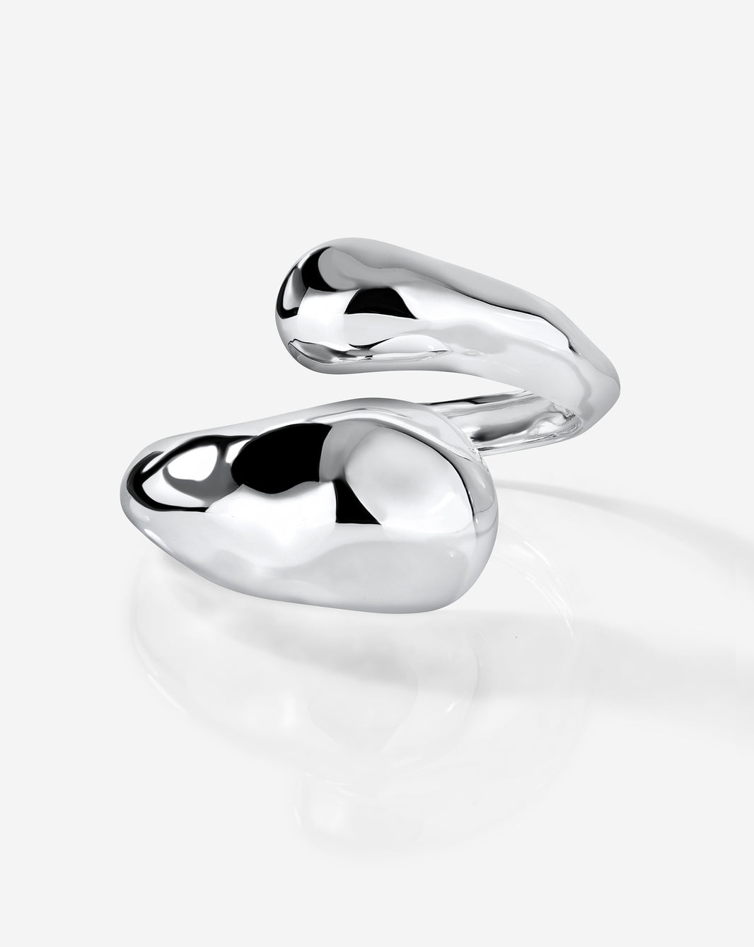 Coco Curved Bangle in 14k gold displayed on white background