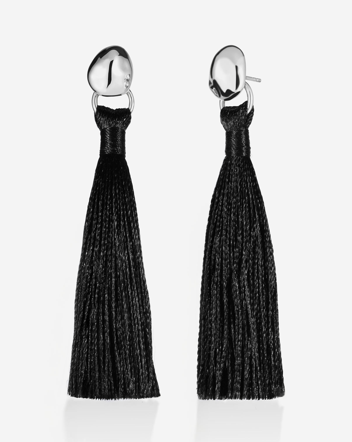 Coco Tassel Earrings featuring delicate gold chain tassels with elegant drop design, displayed on white background