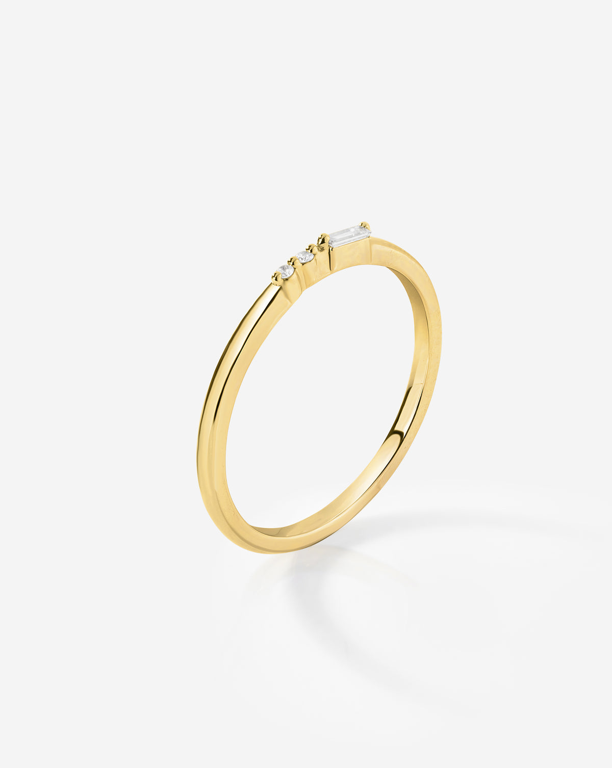 Ring Concierge Baguette + Round Diamond Ring from the Holiday Collection featuring alternating baguette and round diamonds in a delicate band