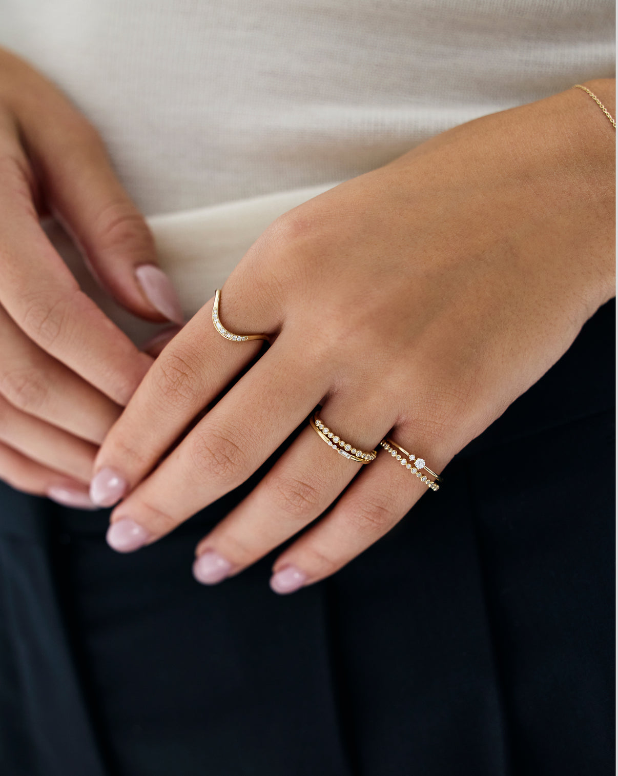 Ring Concierge Curve Diamond Ring styled on hand, a timeless piece from the Holiday Gifting Collection