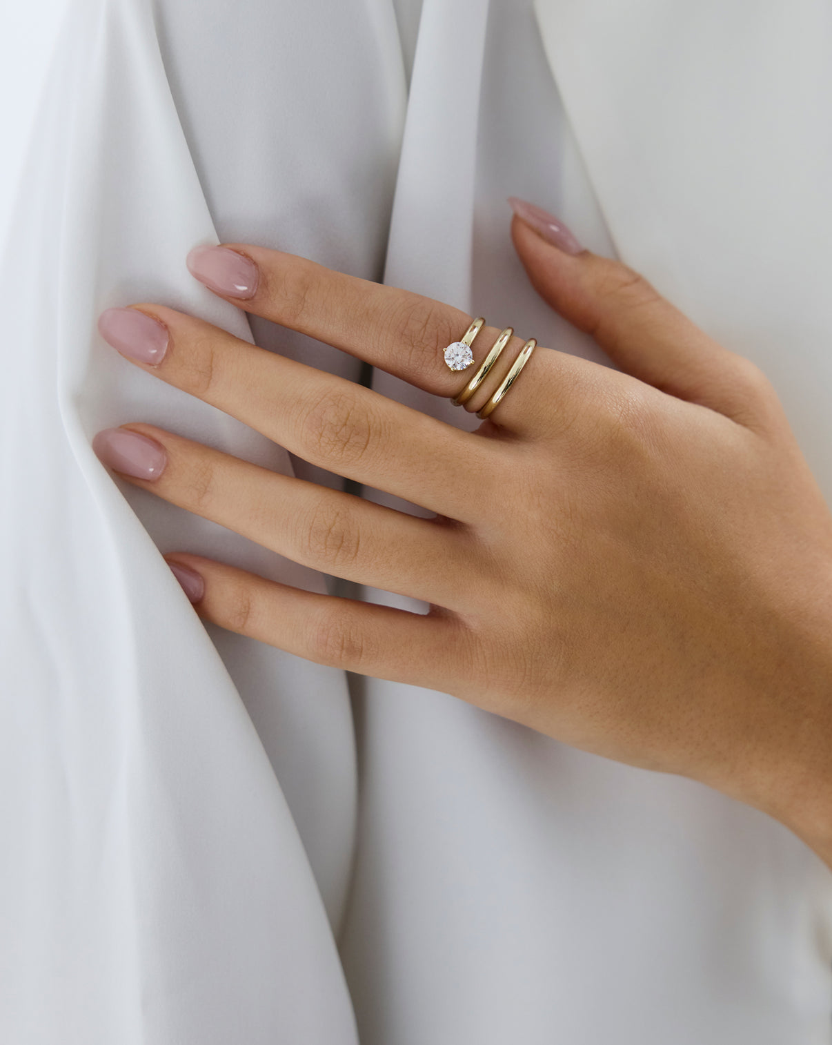 Woman wearing Ring Concierge Diamond Coil Ring from the Holiday Collection at elegant celebration