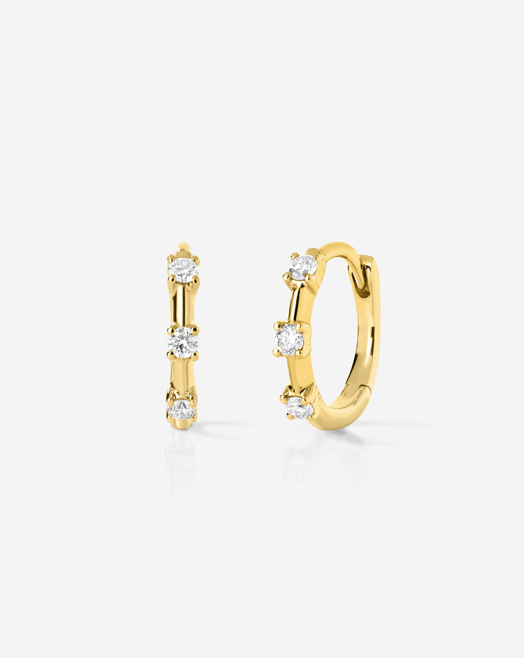  Ring Concierge Diamond Station Huggies in 14k gold featuring sparkling diamond stations, part of the Holiday Collection