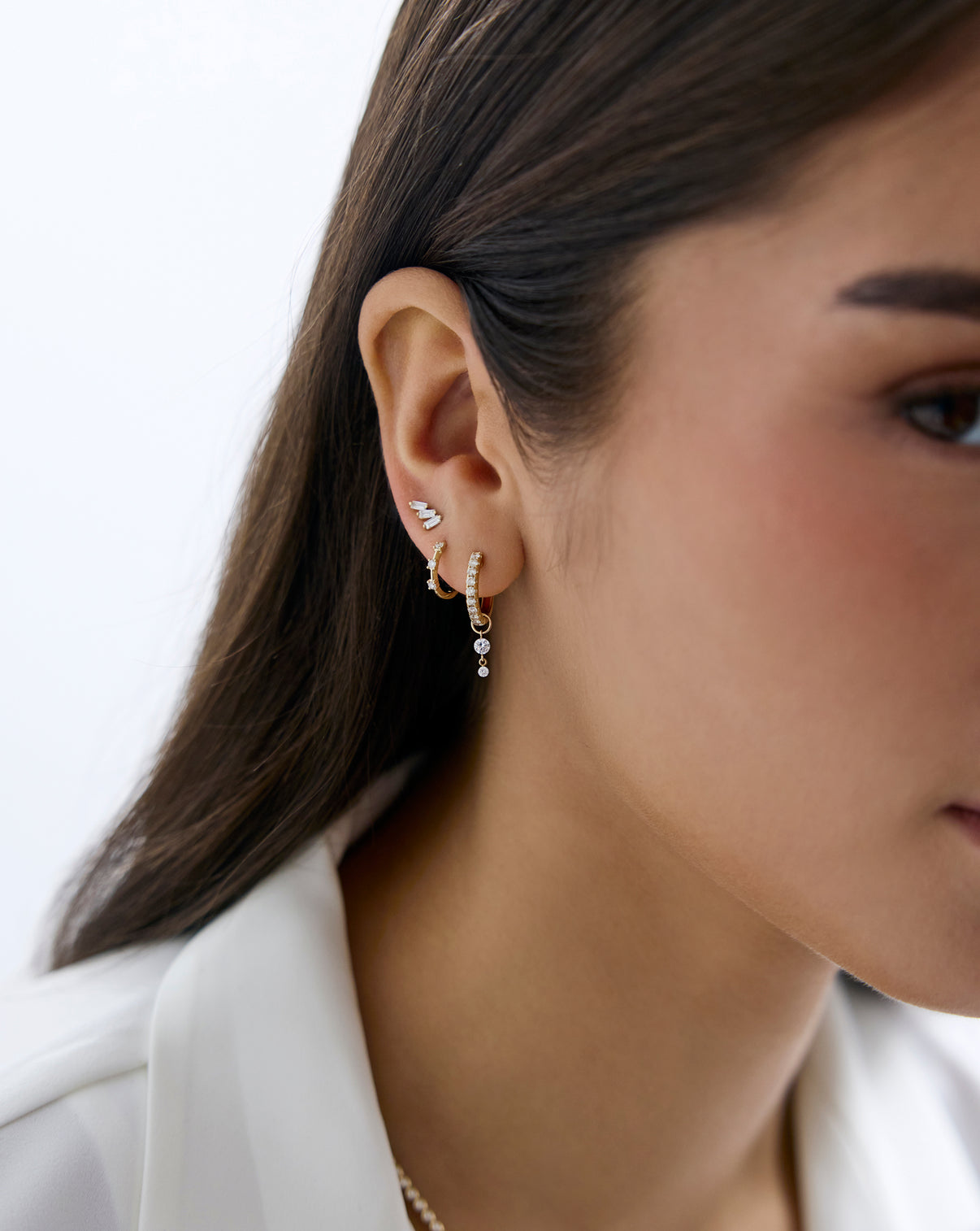 Ring Concierge Diamond Station Huggies Holiday Collection earrings, perfect for holiday gifting and special occasions