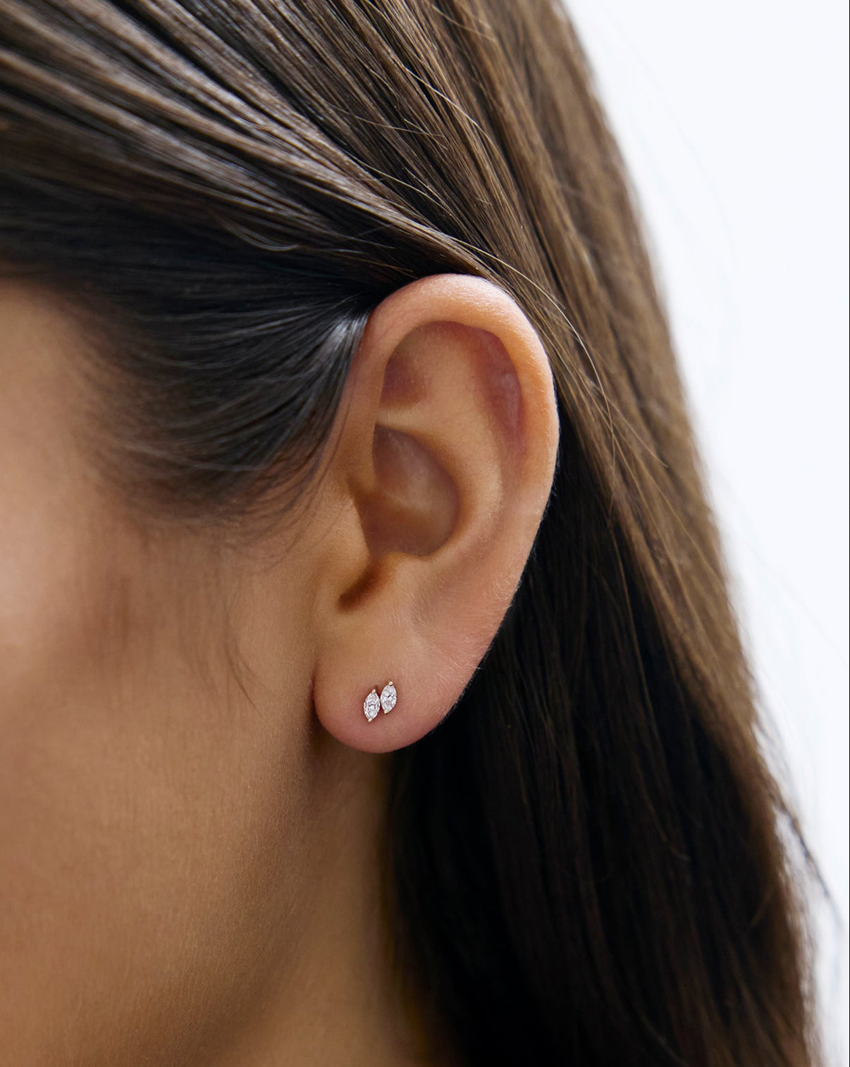 Ring Concierge Double Marquise Studs from the Holiday Collection worn on ear - elegant diamond stud earrings perfect for holiday gifting