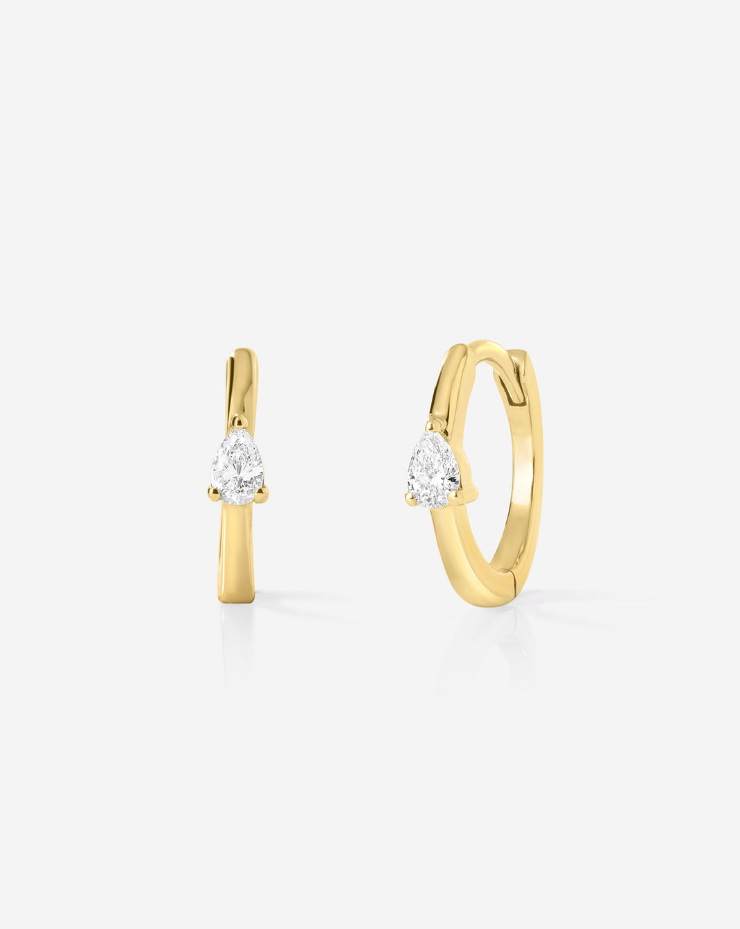 Ring Concierge Mini Pear Huggies from the Holiday Gifting Collection - 14k gold hoop earrings with pear-shaped diamonds
