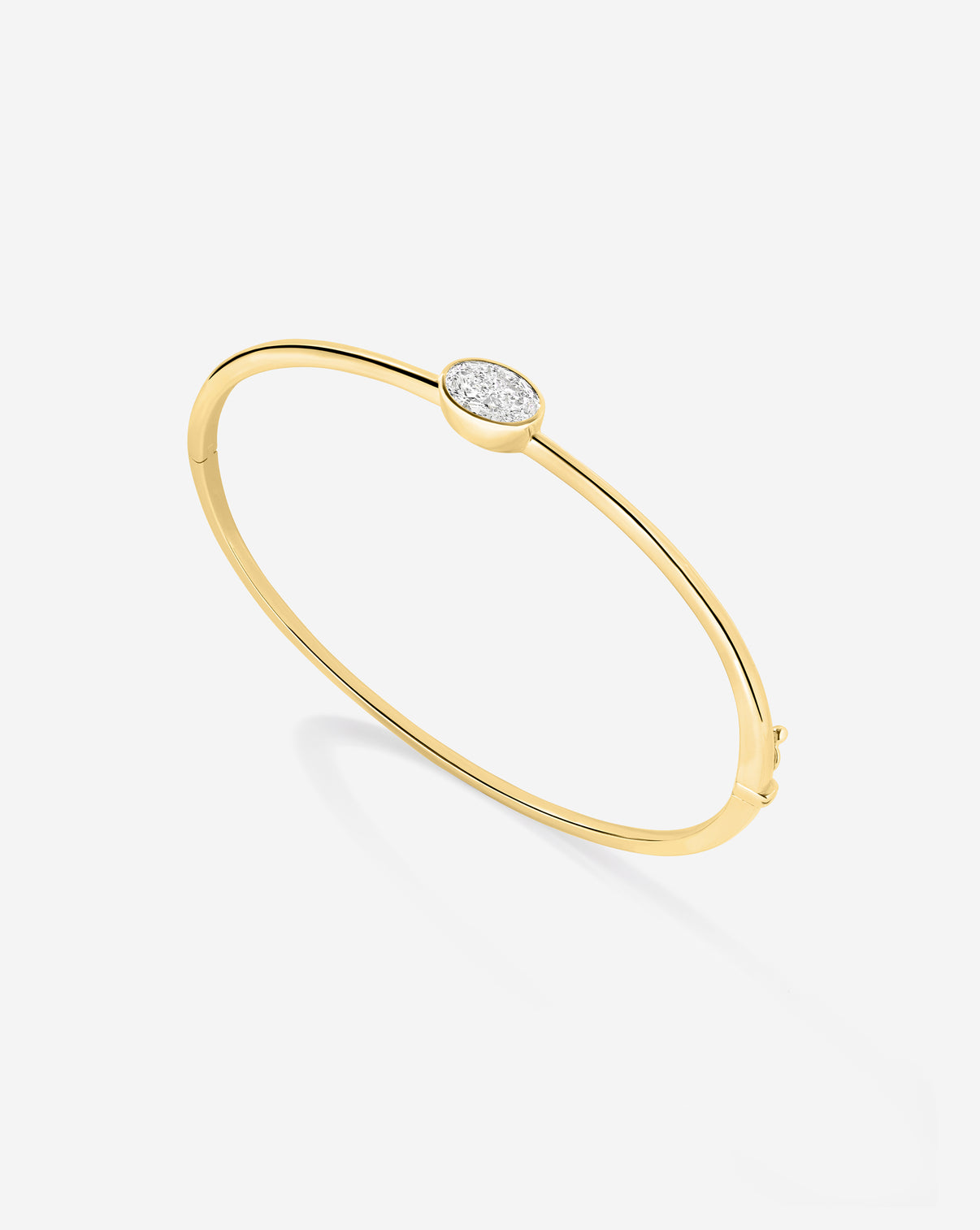 Oval Bangle detail shot - Ring Concierge Holiday Collection fine jewelry