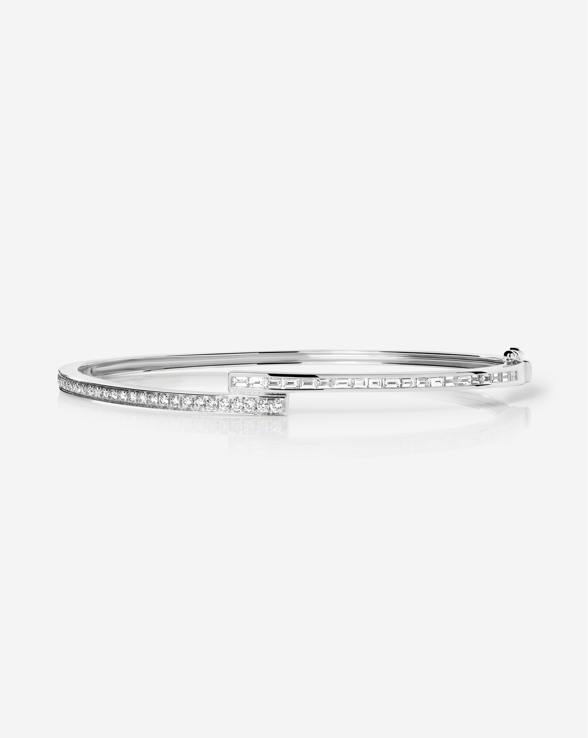 Artistic angle of Baguette + Round Diamond Wrap Bangle emphasizing the luxurious gold and diamond construction