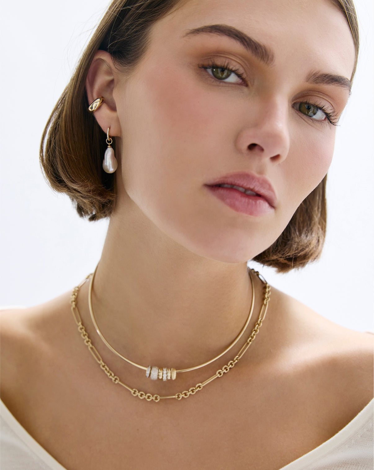 Pearl Huggie Charms by Ring Concierge - Holiday Collection worn on model