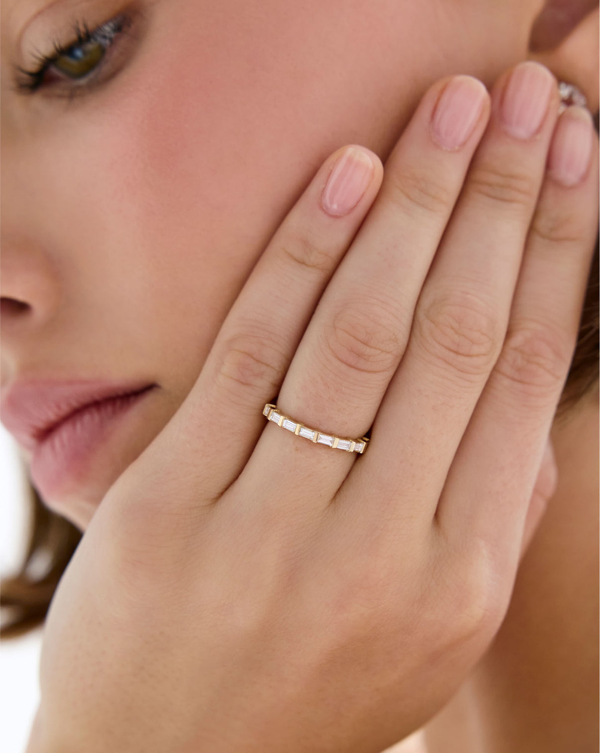 model wearing Baguette Bar Diamond  Eternity Band in 14k Yellow gold
