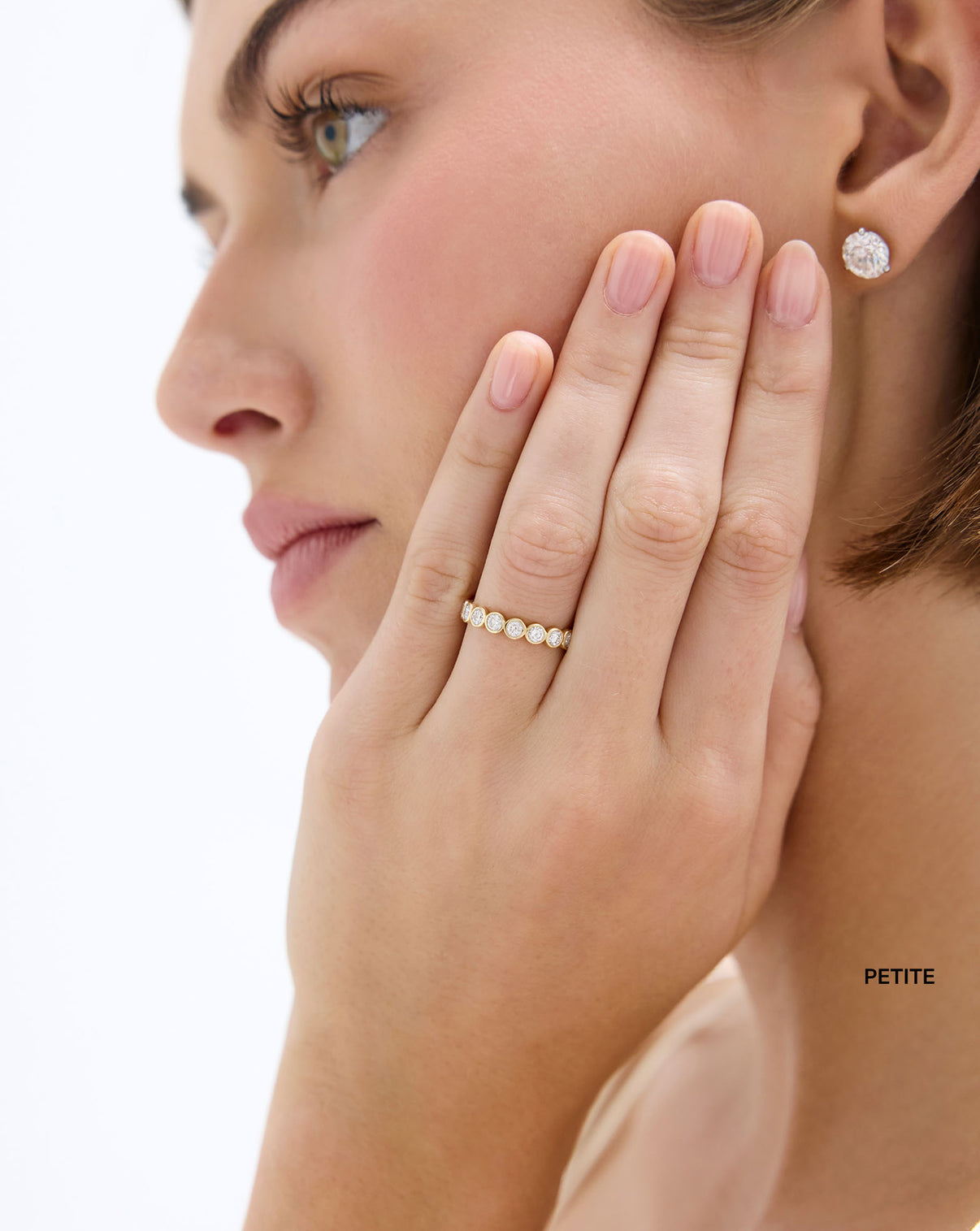 model wearing Petite 1.5 Carat Weight Diamond Round Bezel Eternity Band ring global