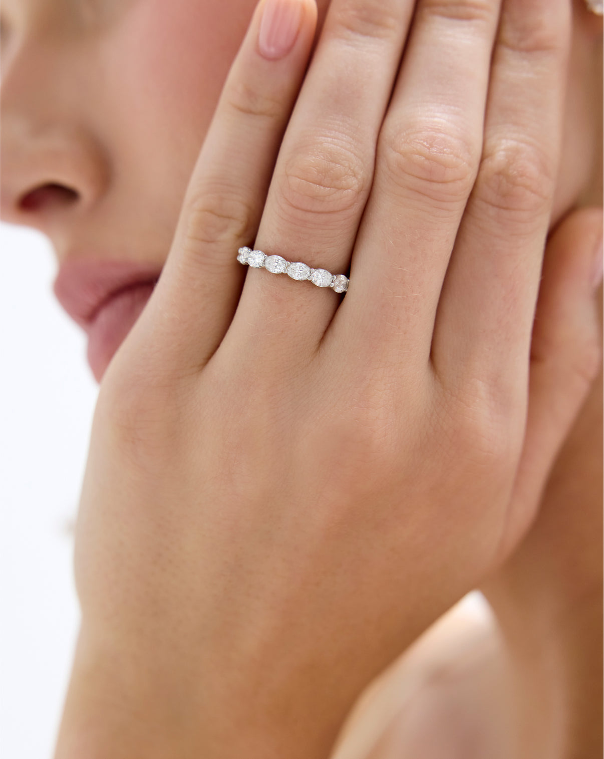 Model wearing Sideways Oval Diamond Eternity Band in Platinum global