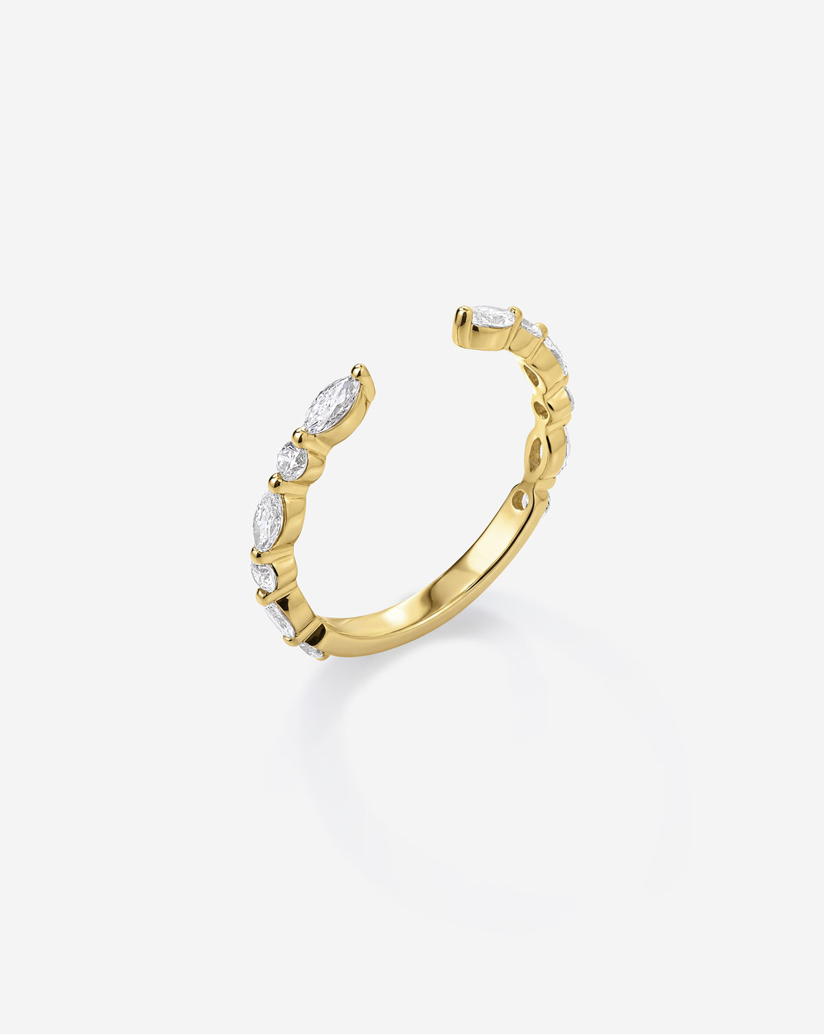 Angled side view of the Marquise + Round Open Diamond Band in 14k yellow gold, showcasing alternating marquise and round natural diamonds along a delicate open band. 14k Yellow Gold