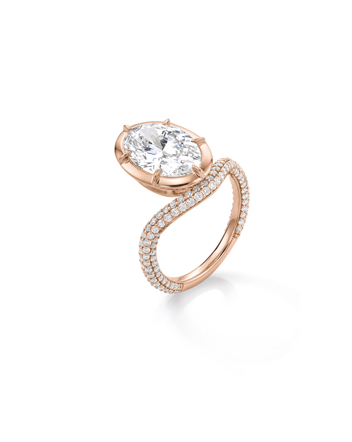 Angled view of a Pave Nest with Oval Diamonds and round brilliant diamonds at its setting of 14k Rose Gold 67602061819992