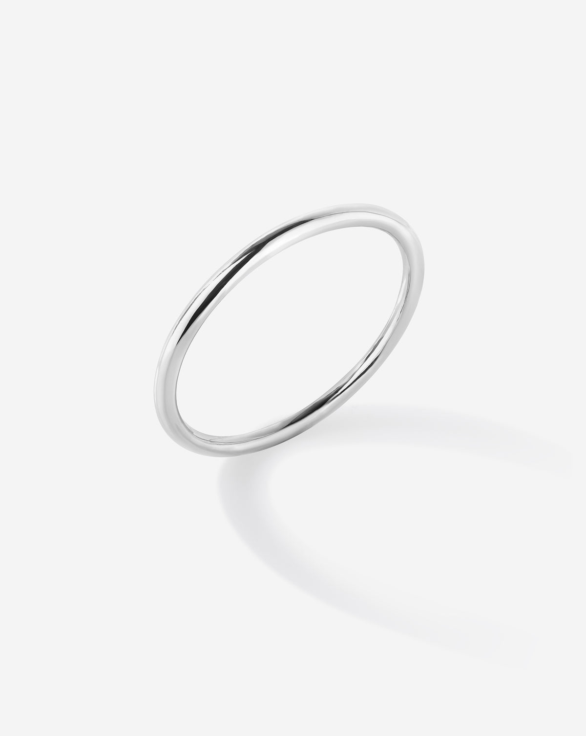 Angled view of the Sterling Silver Petite Stackable Ring. Sterling silver 