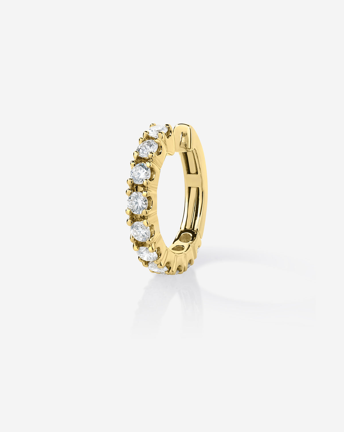 14k yellow gold jumbo diamond ear cuff featuring a row of round-cut diamonds in prong settings, displayed upright on a white background.