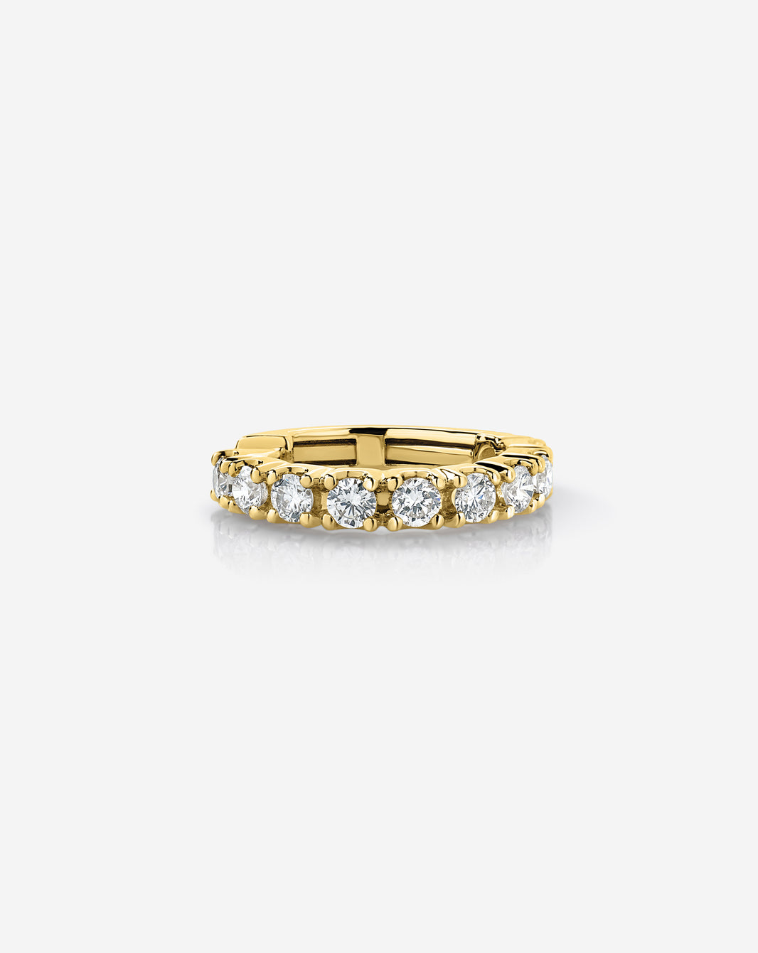 14k yellow gold jumbo diamond ear cuff featuring a row of round-cut diamonds in a classic prong setting, displayed on a white background.