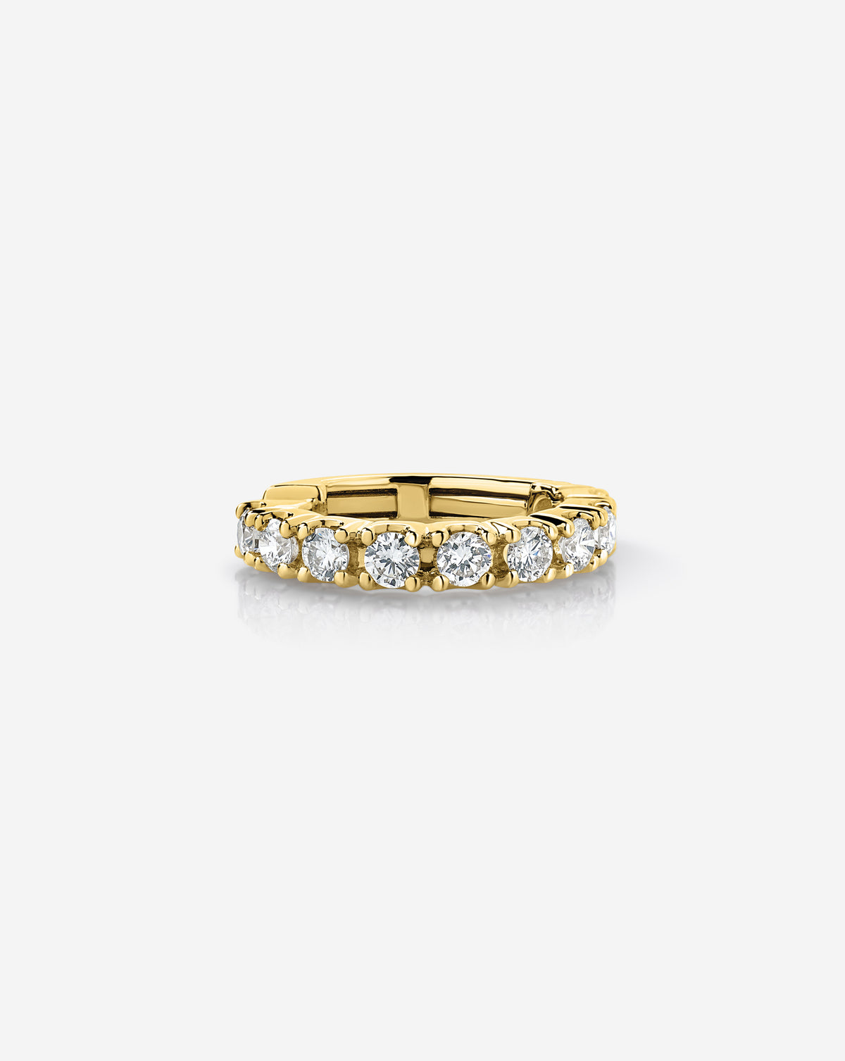 14k yellow gold jumbo diamond ear cuff featuring a row of round-cut diamonds in a classic prong setting, displayed on a white background.
