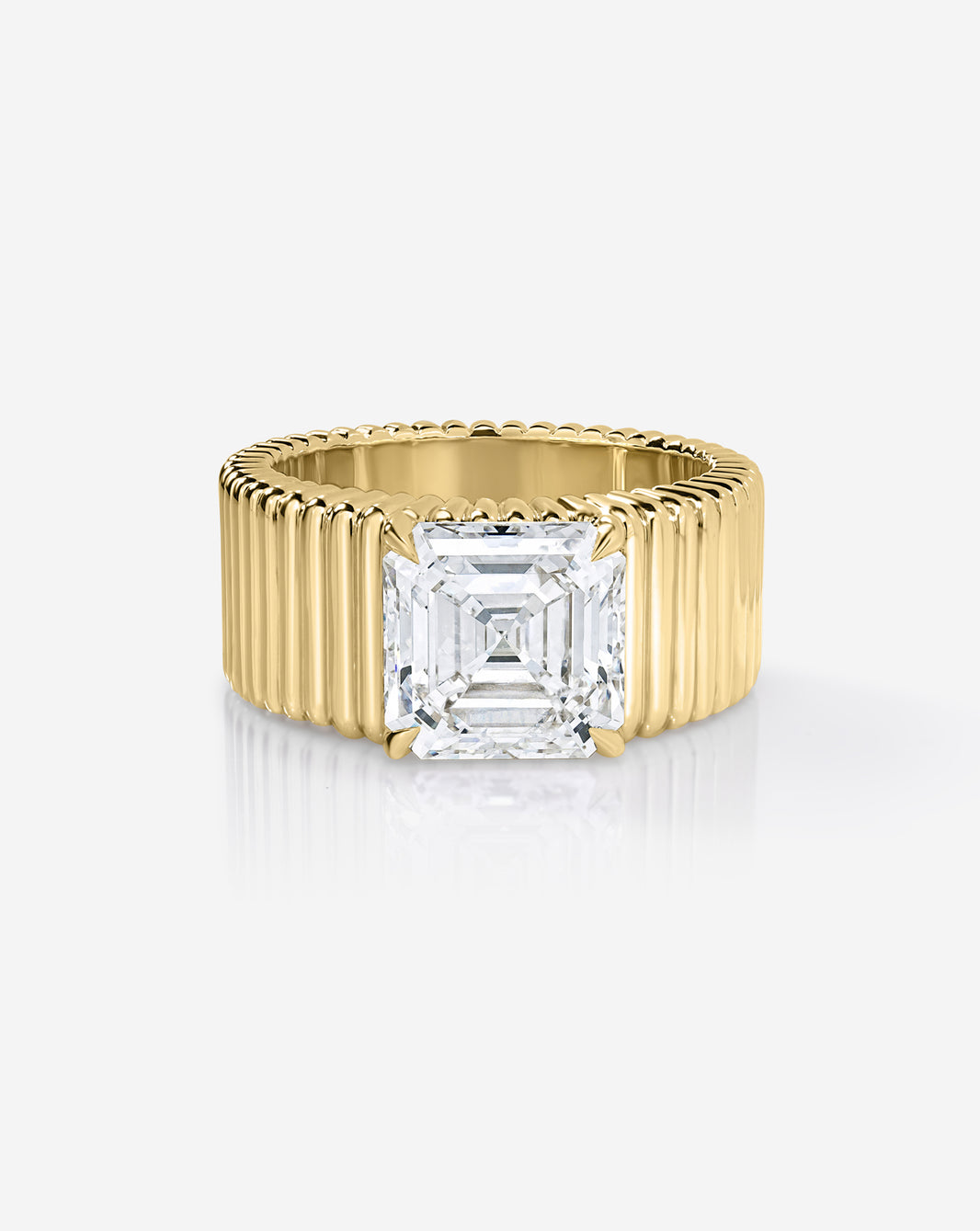 Front view of the Eclipse ring featuring a 2.09-carat marquise lab-grown diamond set horizontally on a wide yellow gold band.