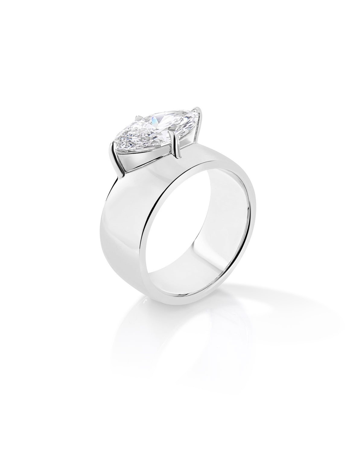 Angled side view of The Eclipse ring with a marquise-cut diamond in a raised setting on a wide platinum half-dome band. 67586768044120