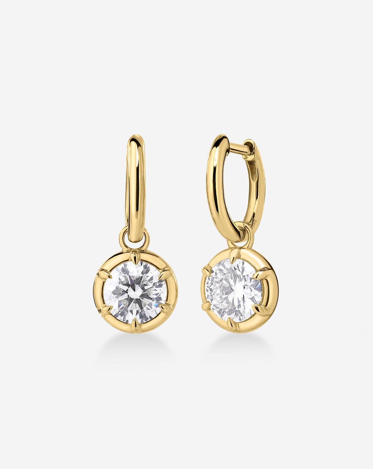 14k Gold drop earrings with round diamonds, on white background