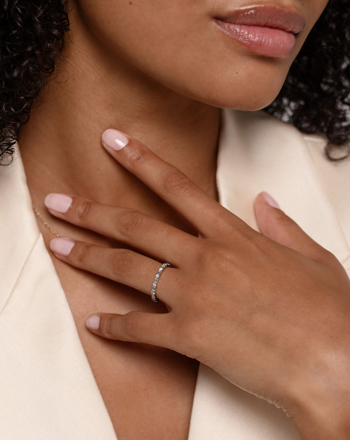 Ring Concierge Baguette + Round Eternity Band Platinum on model with model wearing white blazer