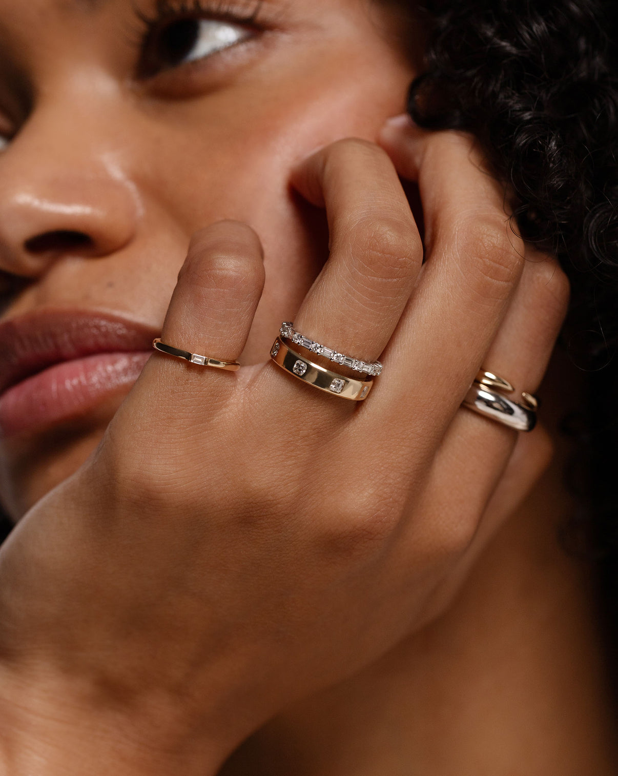 Ring Concierge Baguette + Round Eternity Band Platinum on model paired with fine jewelry and stacked with inlay band