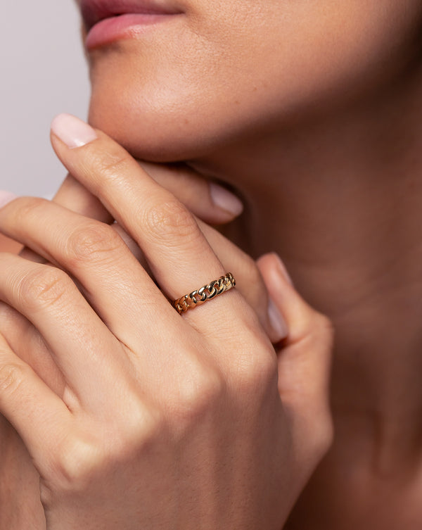 14k yellow gold chain ring shown on model