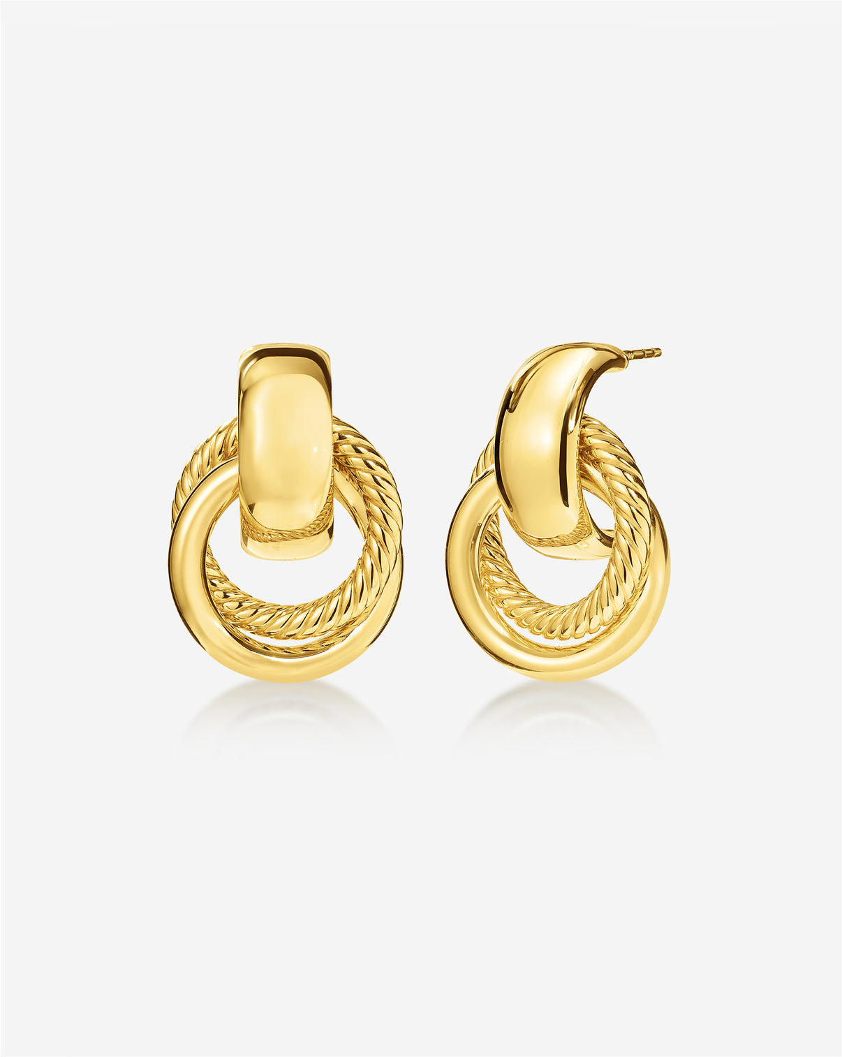 Ghost still of textured door knocker earrings in yellow gold