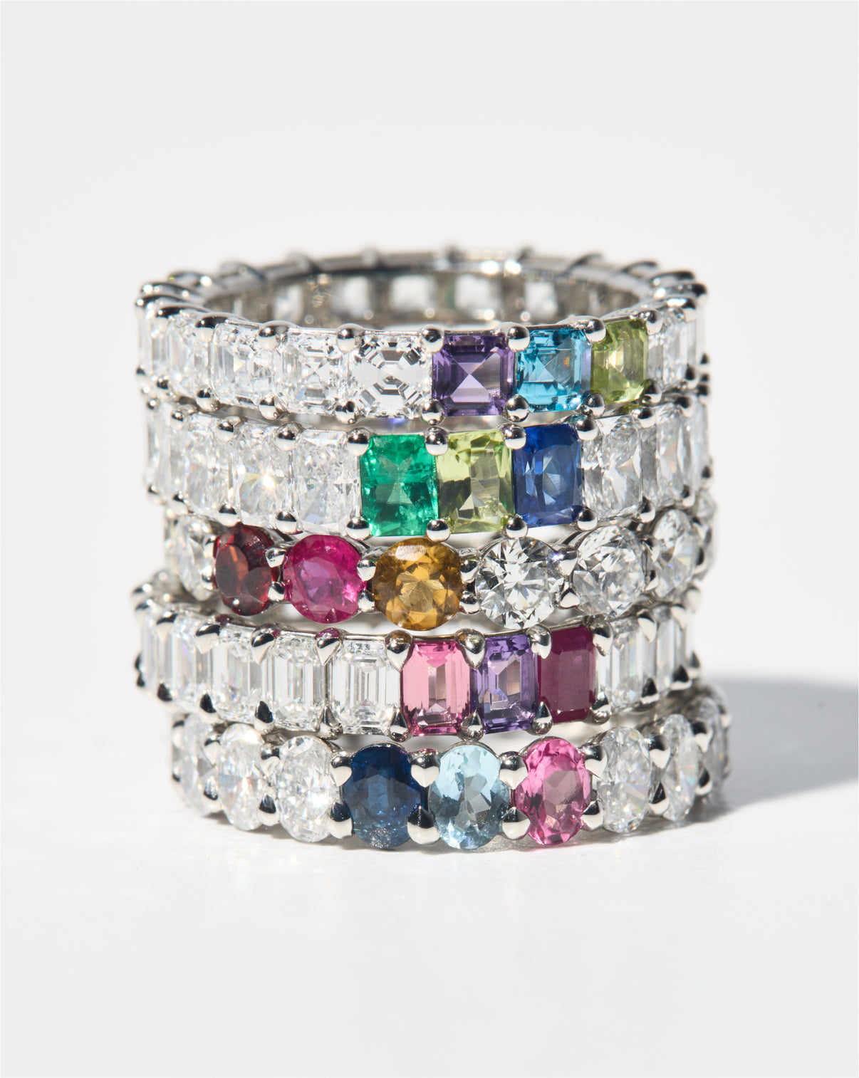 Diamond and Birthstone Eternity Band stacked with several diamond and multi colored birthstone bands against a white background Diamond and Birthstone Eternity Band Petite Classic Luxe Platinum 14k Yellow Gold 14k Rose Gold