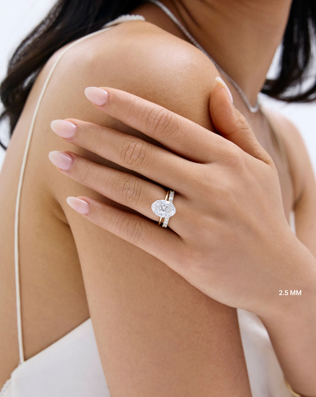 Model wearing 2.5 mm Diamond Ring with engagement ring GLOBAL