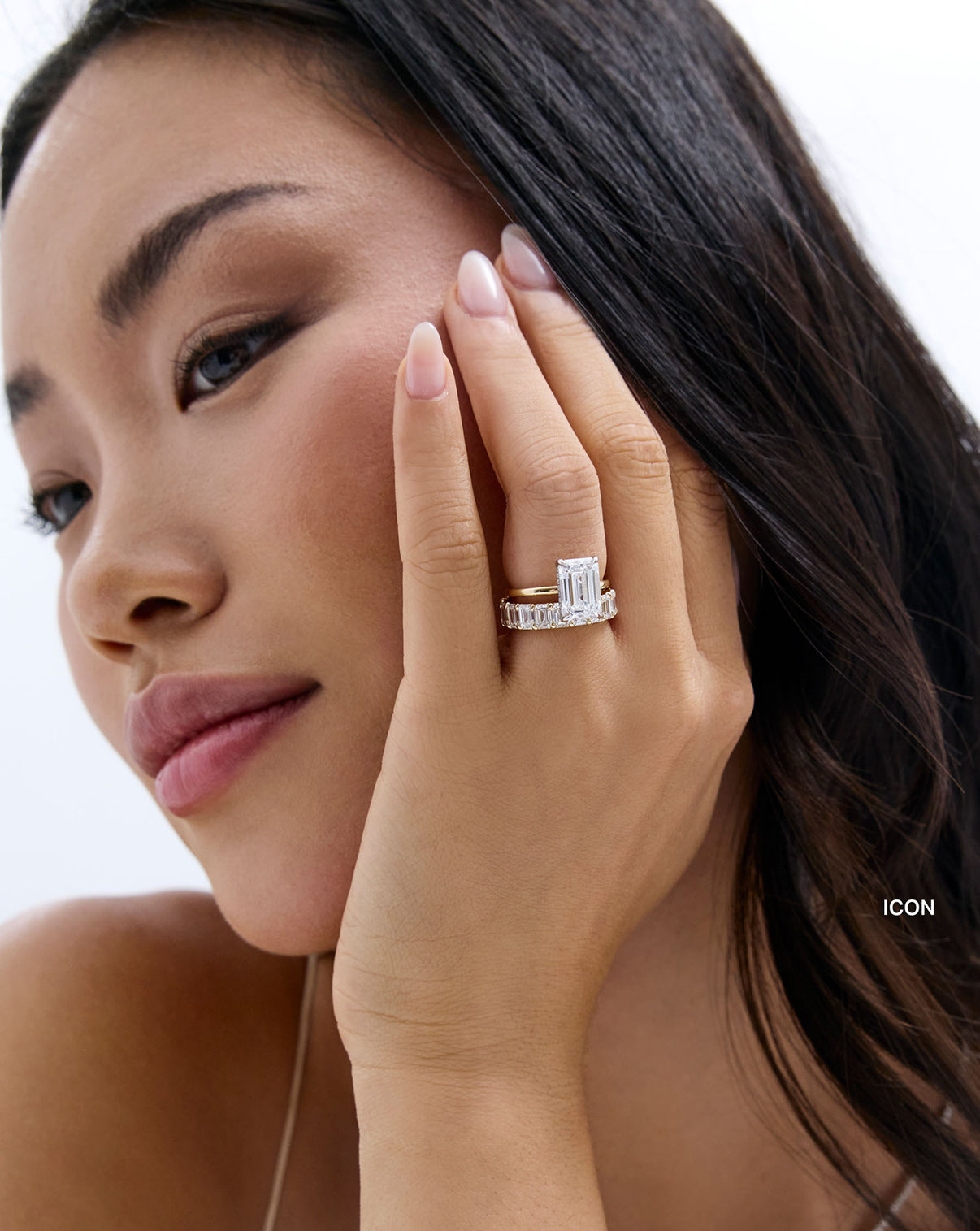 emerald band on-model with engagement ring icon global