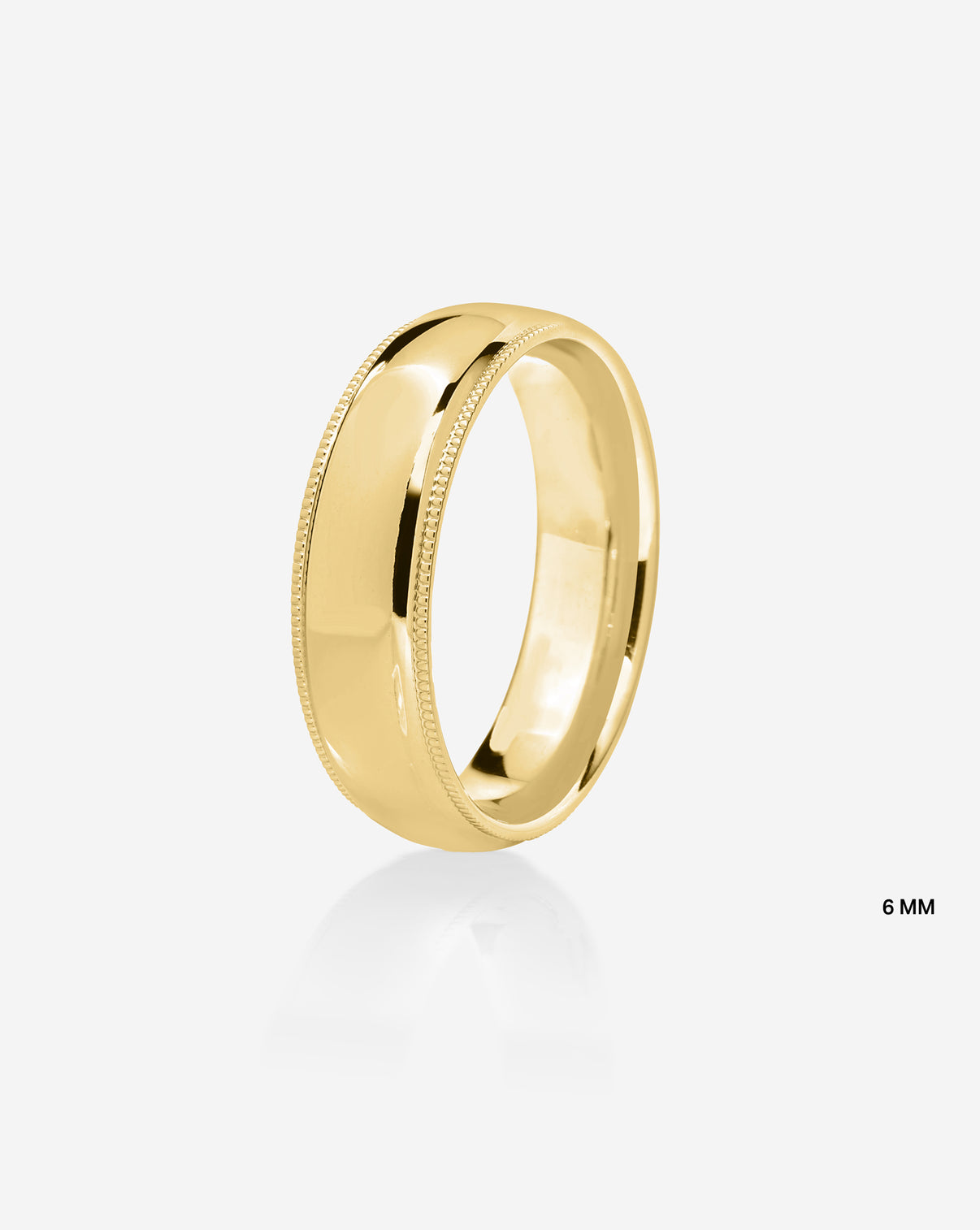 6mm 14k yellow gold milgrain comfort fit on white background side view