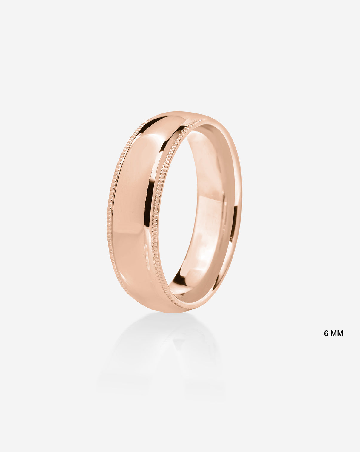 6mm 14k rose gold milgrain comfort fit on white background side view
