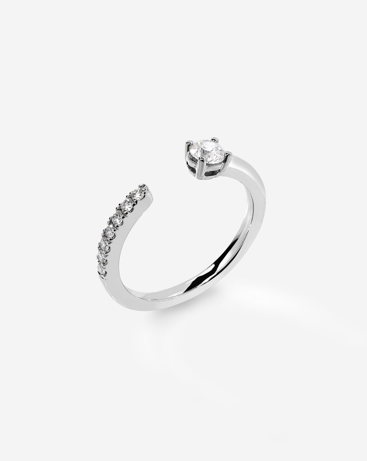 14k white gold open band ring with small diamonds on a white background platinum side view