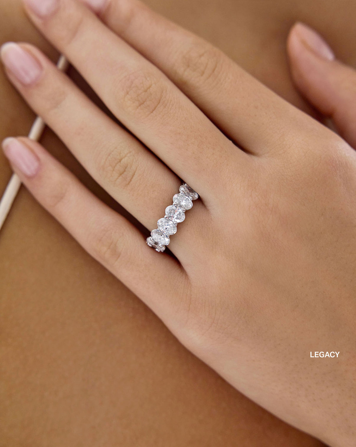legacy oval eternity band styled alone on model global