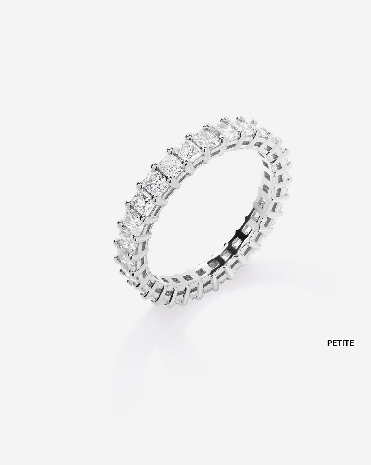 petite radiant eternity band on white background side view Platinum
