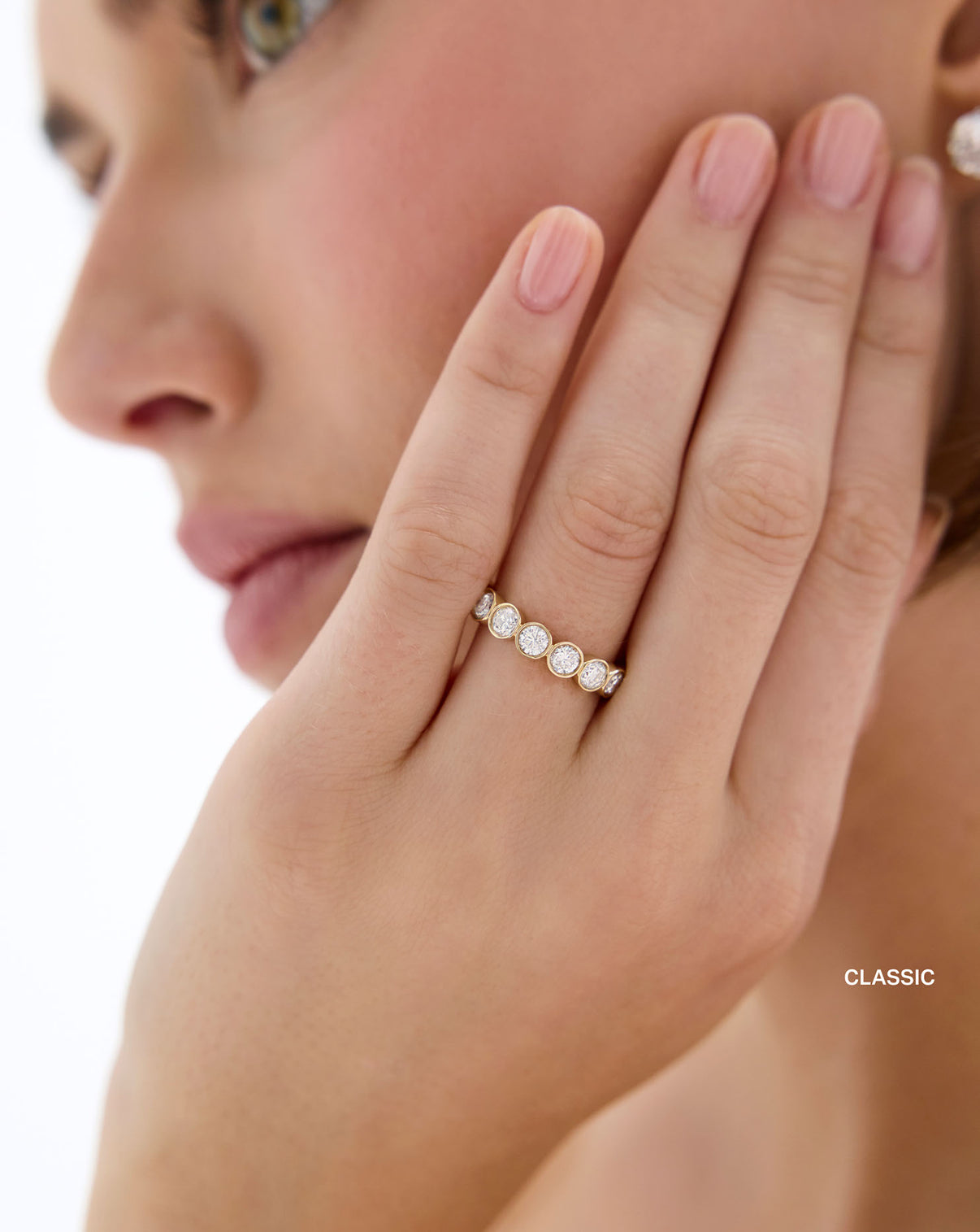 3/4 round bezel lab diamond wedding band classic on model yellow gold global