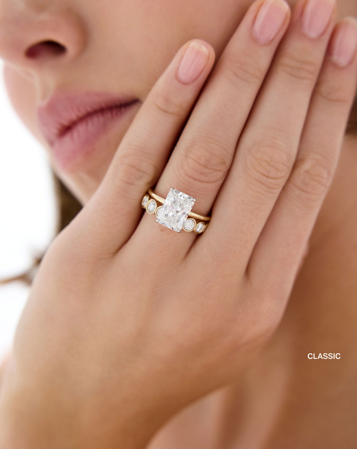 3/4 round bezel lab diamond wedding band classic on model yellow gold with engagement ring global
