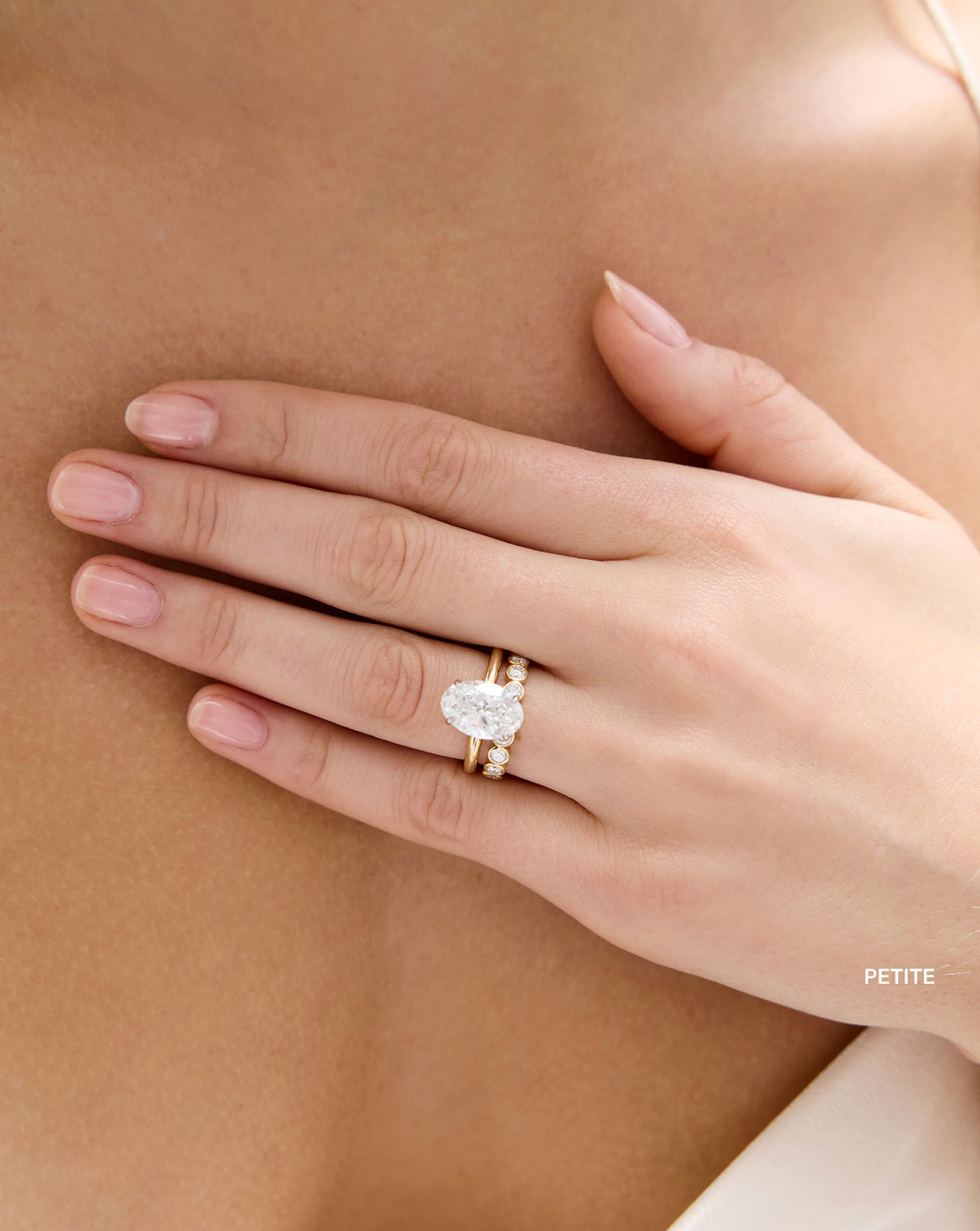 3/4 round bezel lab diamond wedding band petite on model yellow gold with engagement ring global