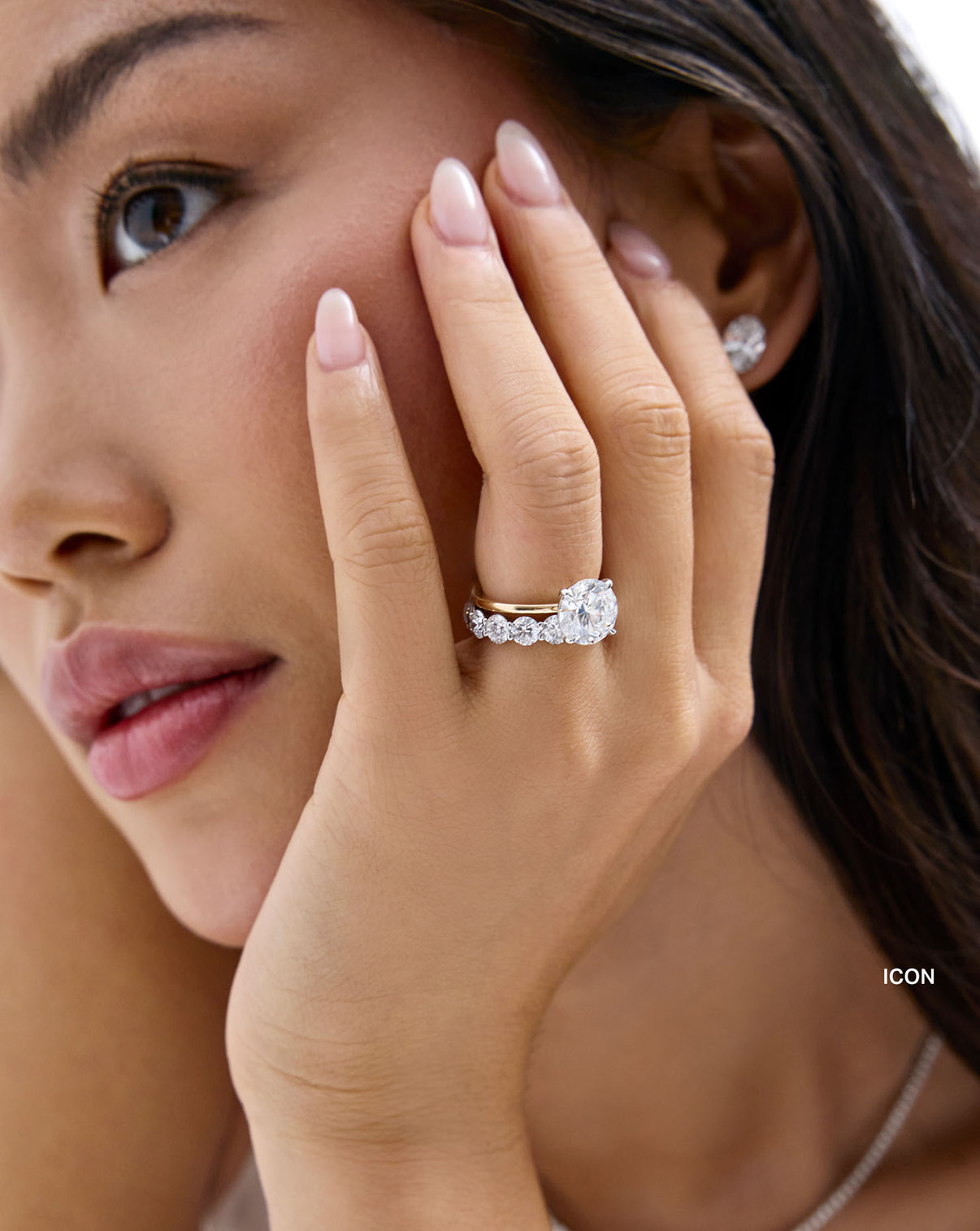 Round 3/4 Lab Diamond Band Icon size shown styled with a round engagement ringon model global
