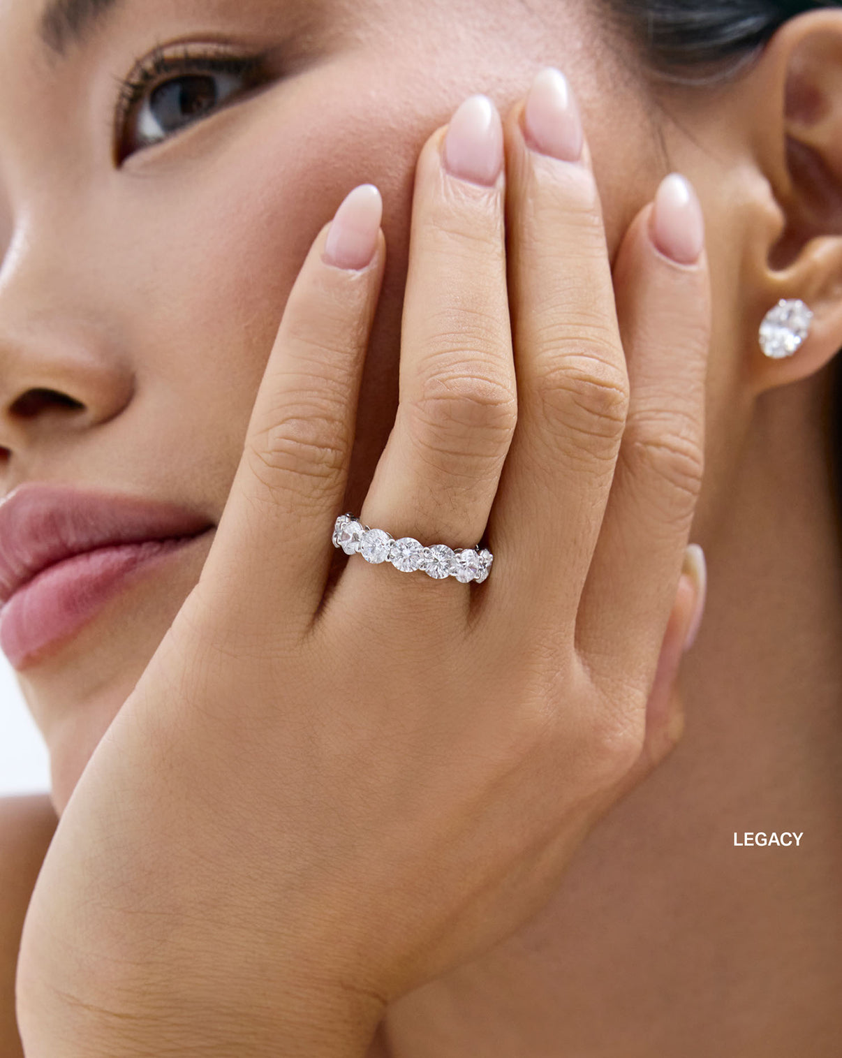 Round 3/4 Diamond Band Legacy size shown styled alone on model global