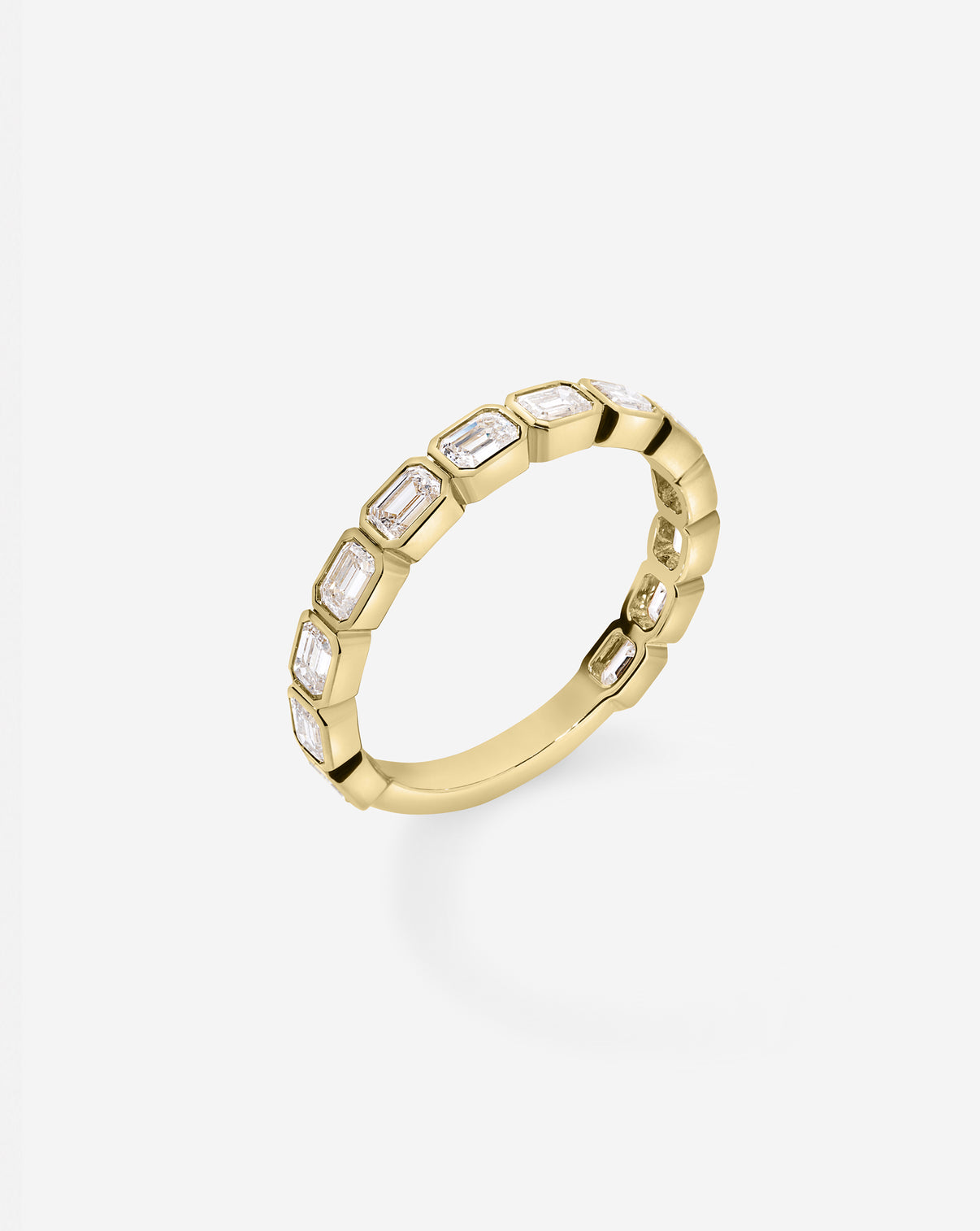 Sideways Emerald Bezel Eternity Band with 3/4 diamond coverage in 14k Yellow Gold standing
