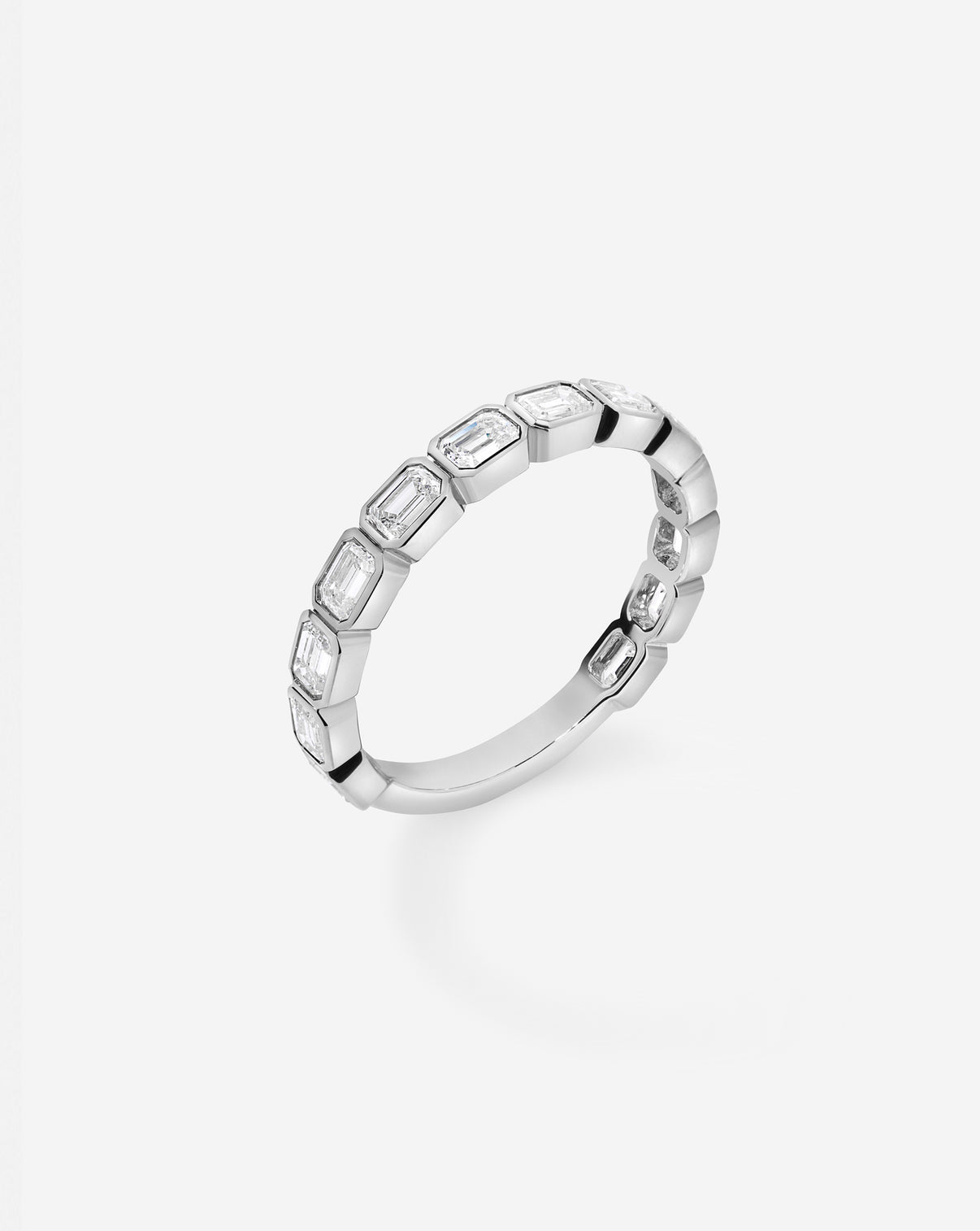 Sideways Emerald Bezel Eternity Band with 3/4 diamond coverage in Platinum side view