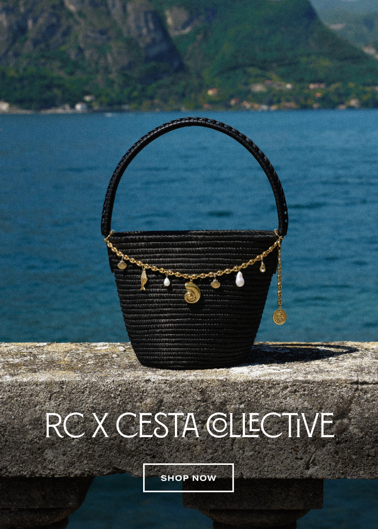 banner image of rc x cesta collective black bag with bag charms against a beach setting